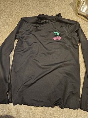 art class Black Ruffle Mock Neck Rasg Guard Swim Shirt with Cherry Accent